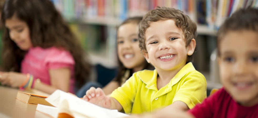 Picture of children smiling in class