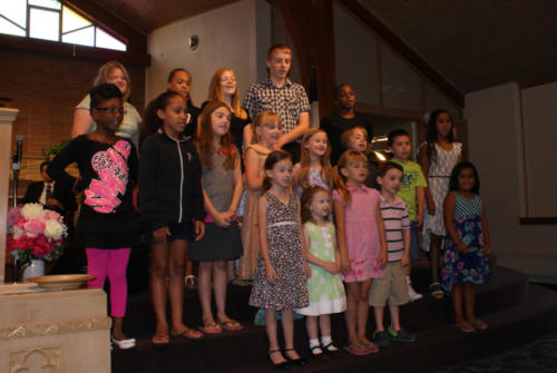 The Junior Church class singing in the Church service